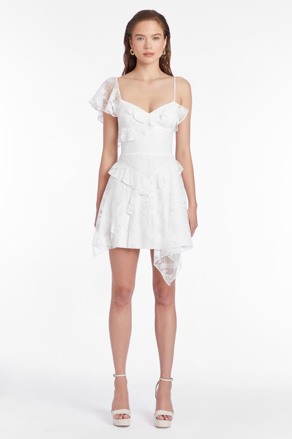white lace mini dress with asymmetrical straps and lace detailing