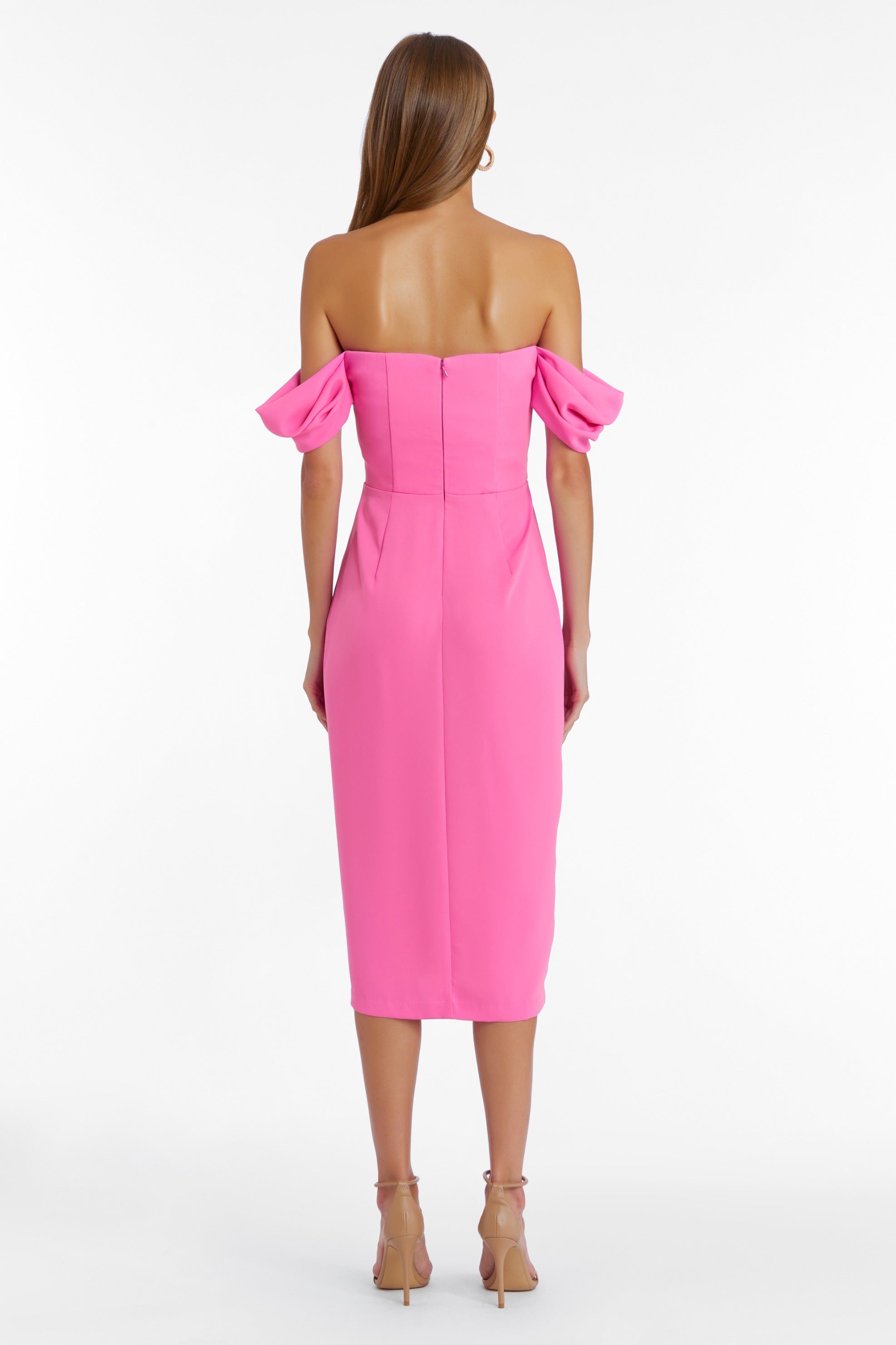 Girl in hot pink off the shoulder midi dress, back facing.