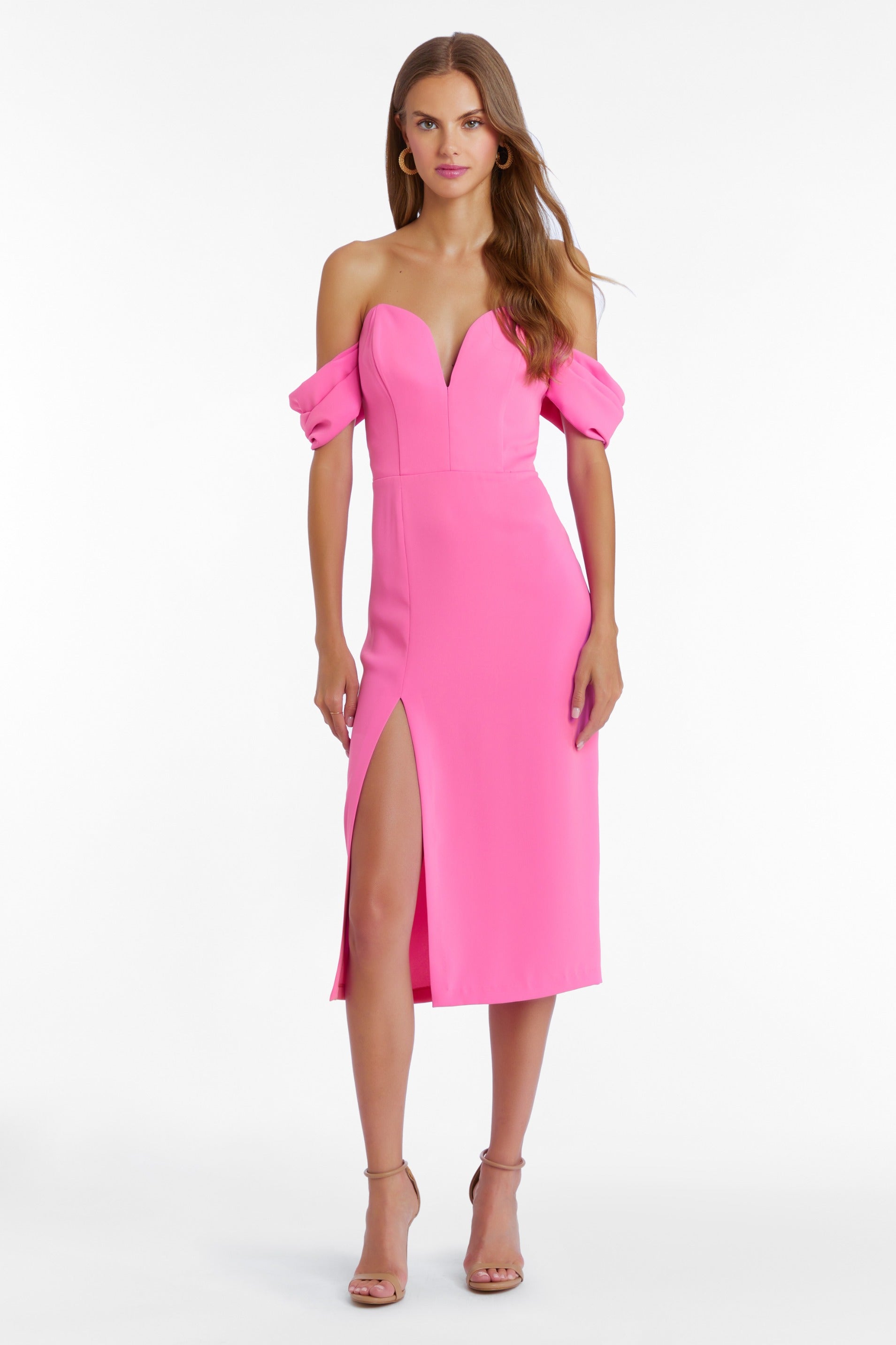 Girl in hot pink off the shoulder midi dress, front facing.