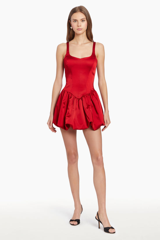 Girl in red dress with bubble hem, front facing. view 1