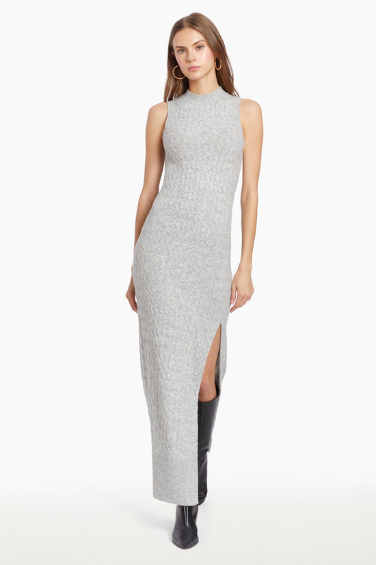 Girl in grey knit dress with slit, front facing. view 2