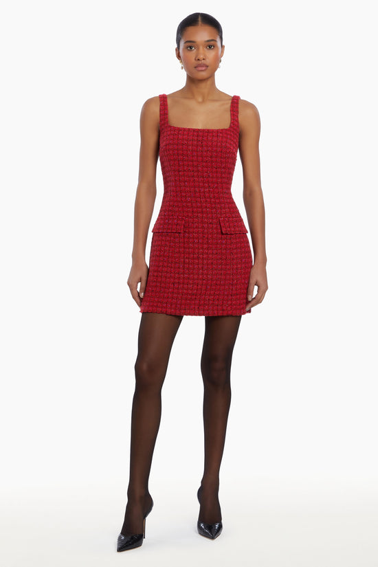 Girl in red houndstooth dress, front facing. view 2