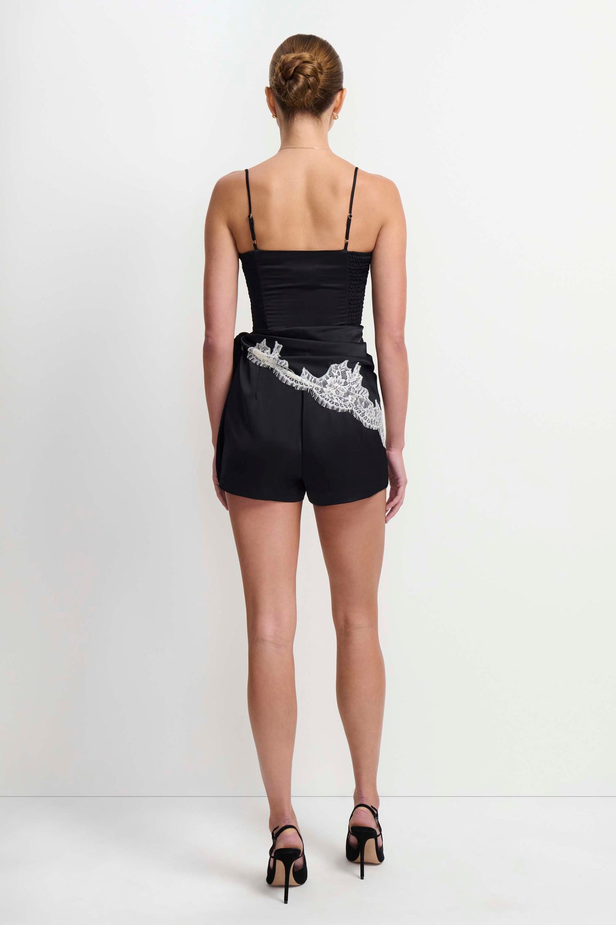 Amanda Uprichard Revan Lace Romper in Black Ivory - side view