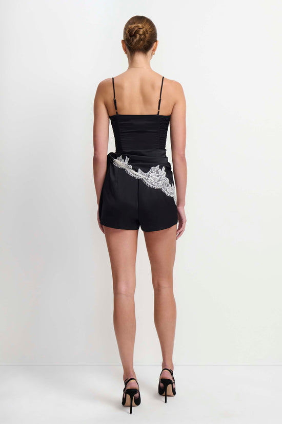 Amanda Uprichard Revan Lace Romper in Black Ivory - side view