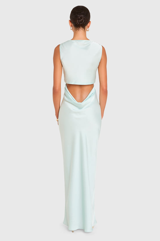 Amanda Uprichard | Roslyn Gown in Celadon Blue. Model wears a pale blue sleeveless maxi dress against a white backgorund. view 3