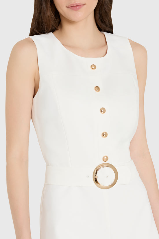 Amanda Uprichard |   Fontaine Romper in Ivory. Model wears a white romper against a white backgorund. view 3