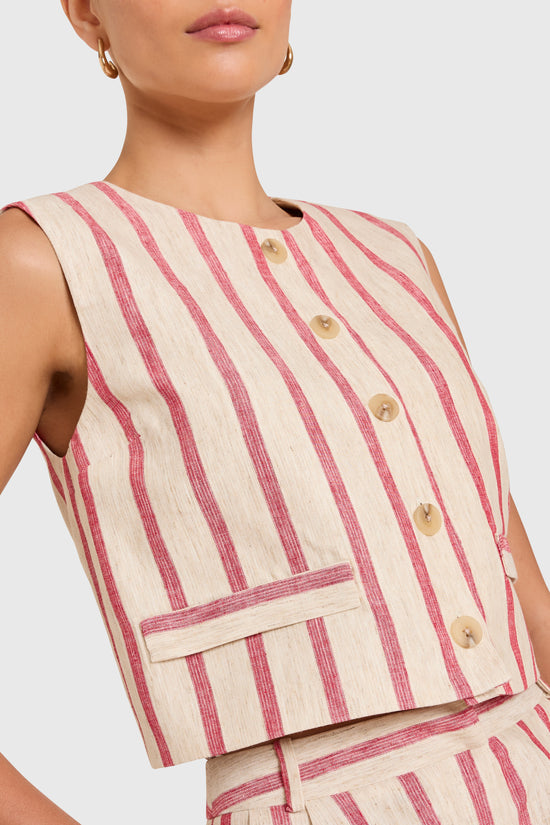 Amanda Uprichard |   Jeremiah Top in Red Stripe. Model wears a linen top against a white backgorund. view 3