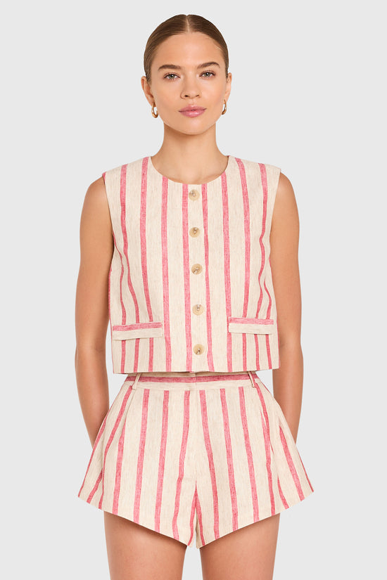 Amanda Uprichard |   Jeremiah Top in Red Stripe. Model wears a linen top against a white backgorund. view 2