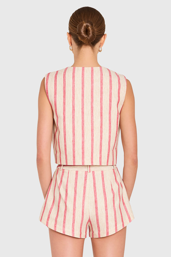 Amanda Uprichard |   Jeremiah Top in Red Stripe. Model wears a linen top against a white backgorund. view 3