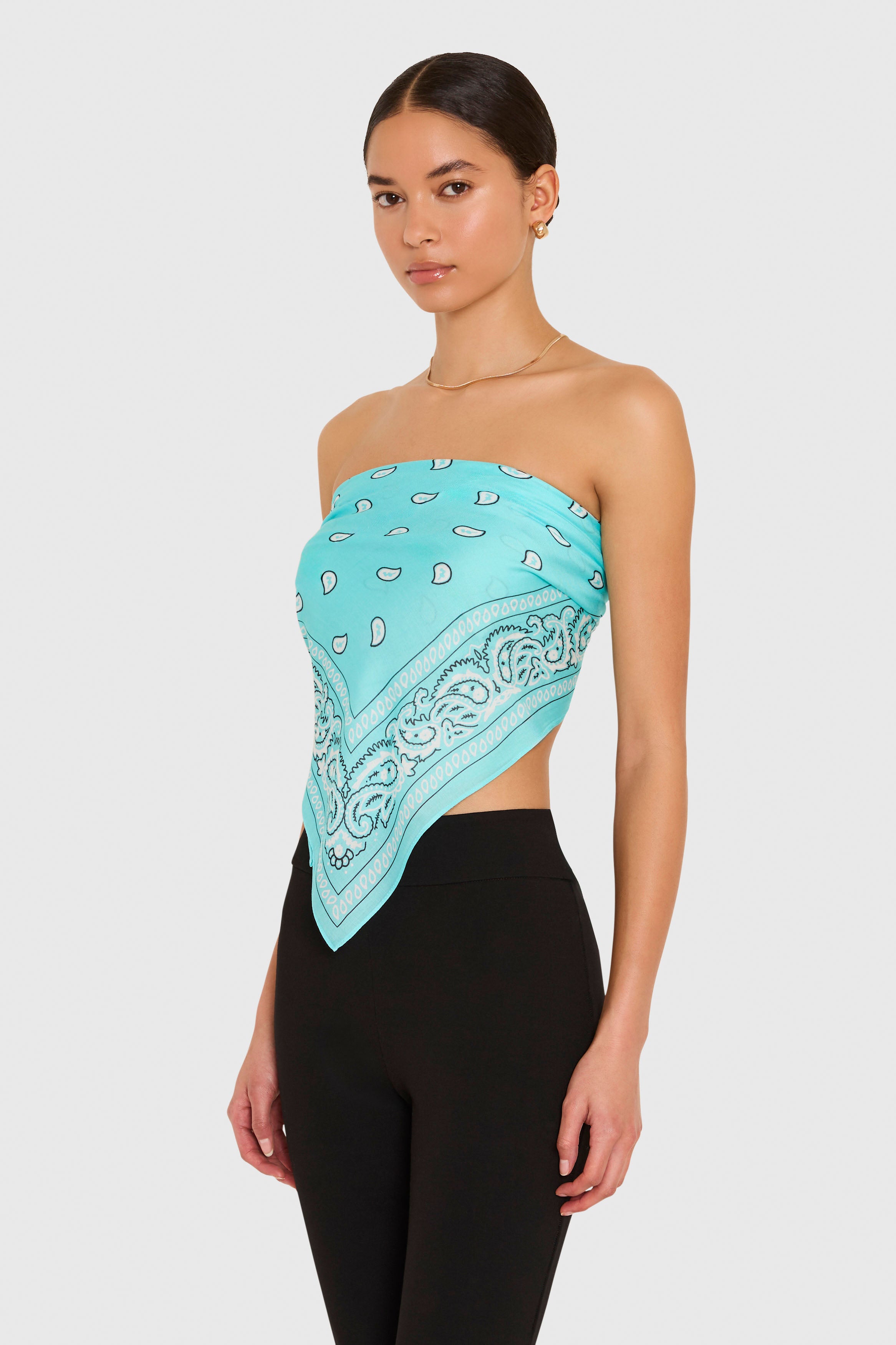 Amanda Uprichard XL Bandana Scarf in Baby Blue. Model wears scarf as a strapless top against a white background. 