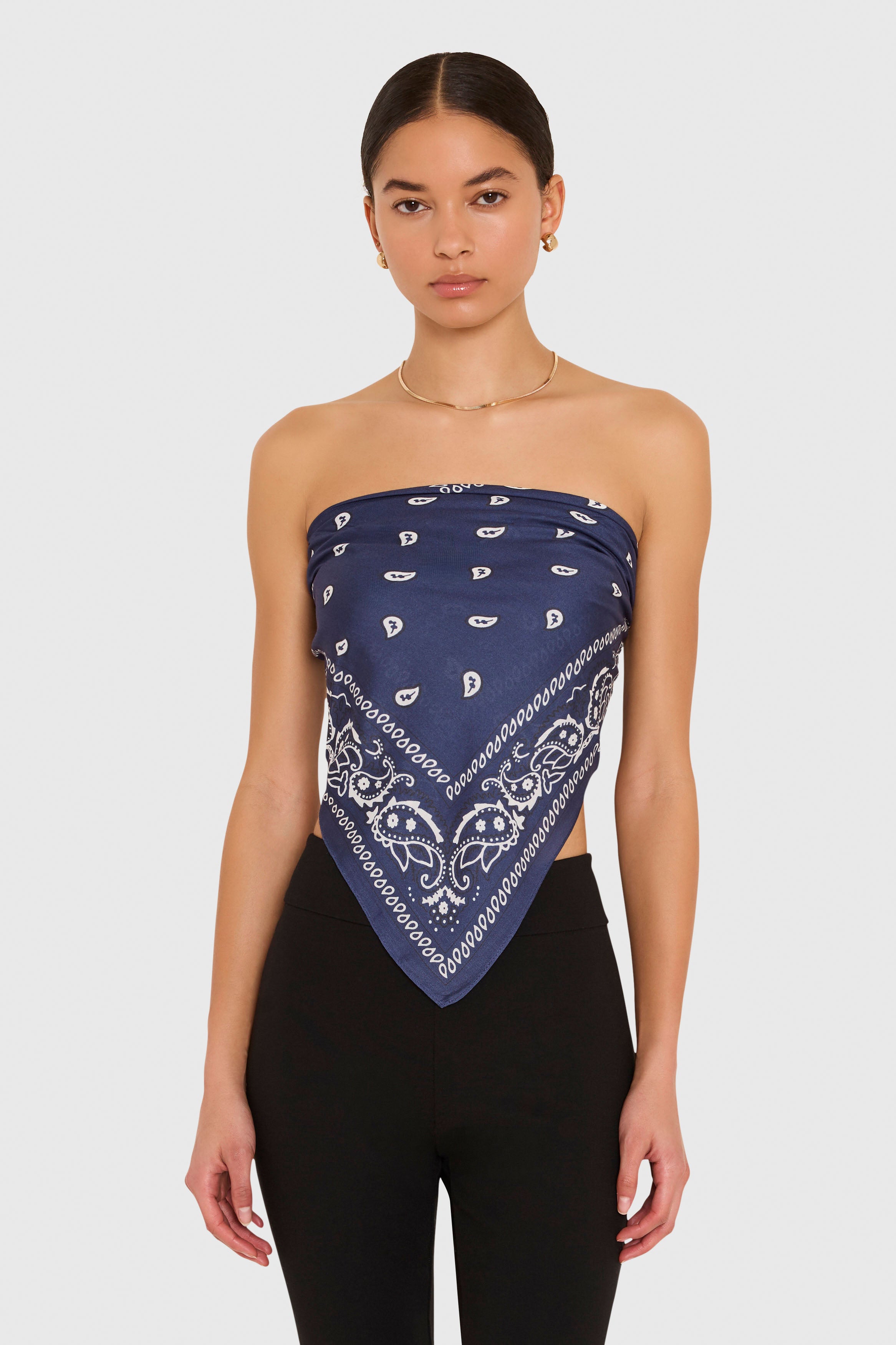 Amanda Uprichard XL Bandana Scarf in Navy Blue. Model wears scarf as a strapless top against a white background. 
