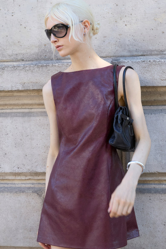 Amanda Uprichard Karla Romper in Patent Leather in Burgundy - editorial image