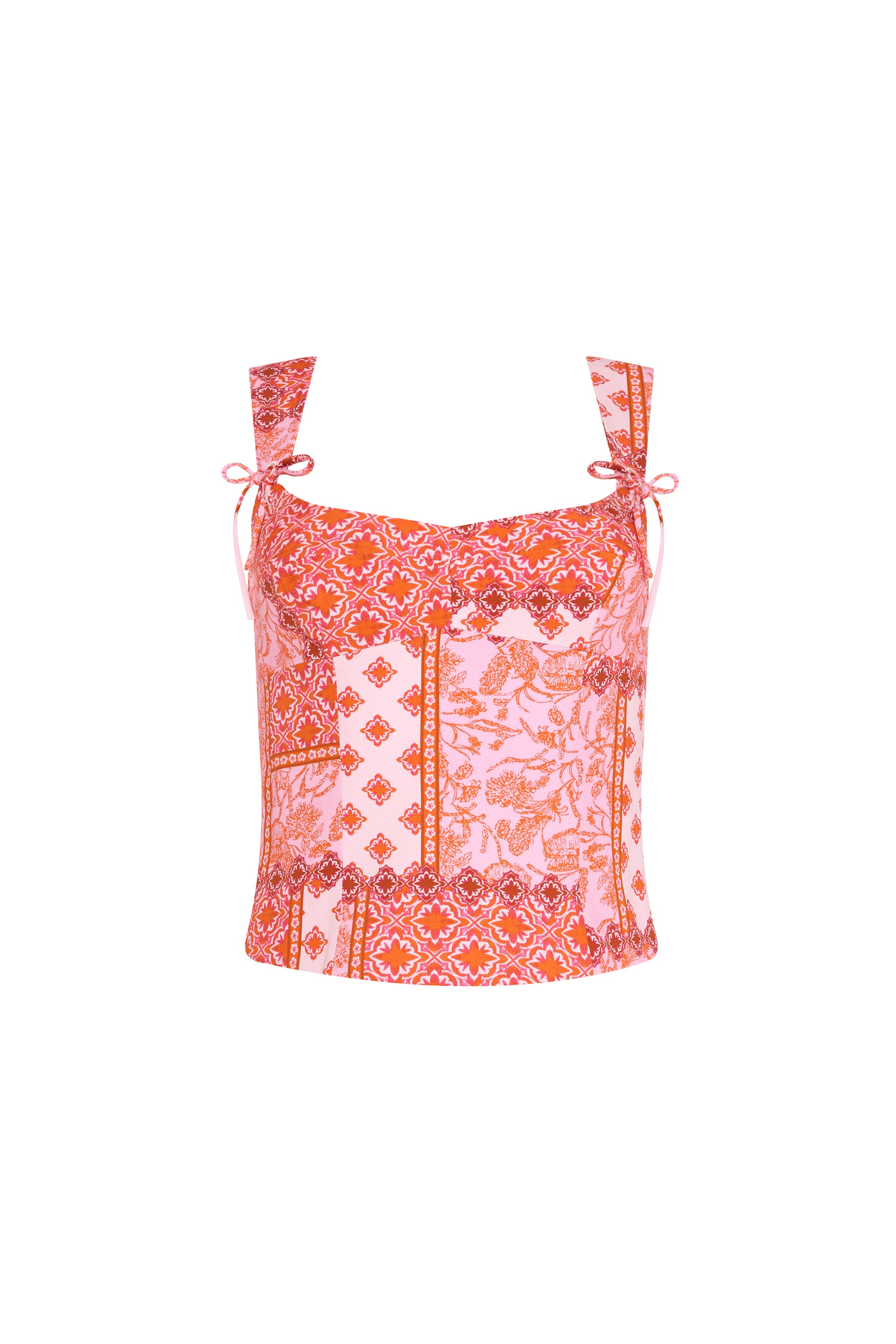 Amanda Uprichard |   Candice Top in Sardinia Print. Pink patchwork patterened top against a white backgorund.