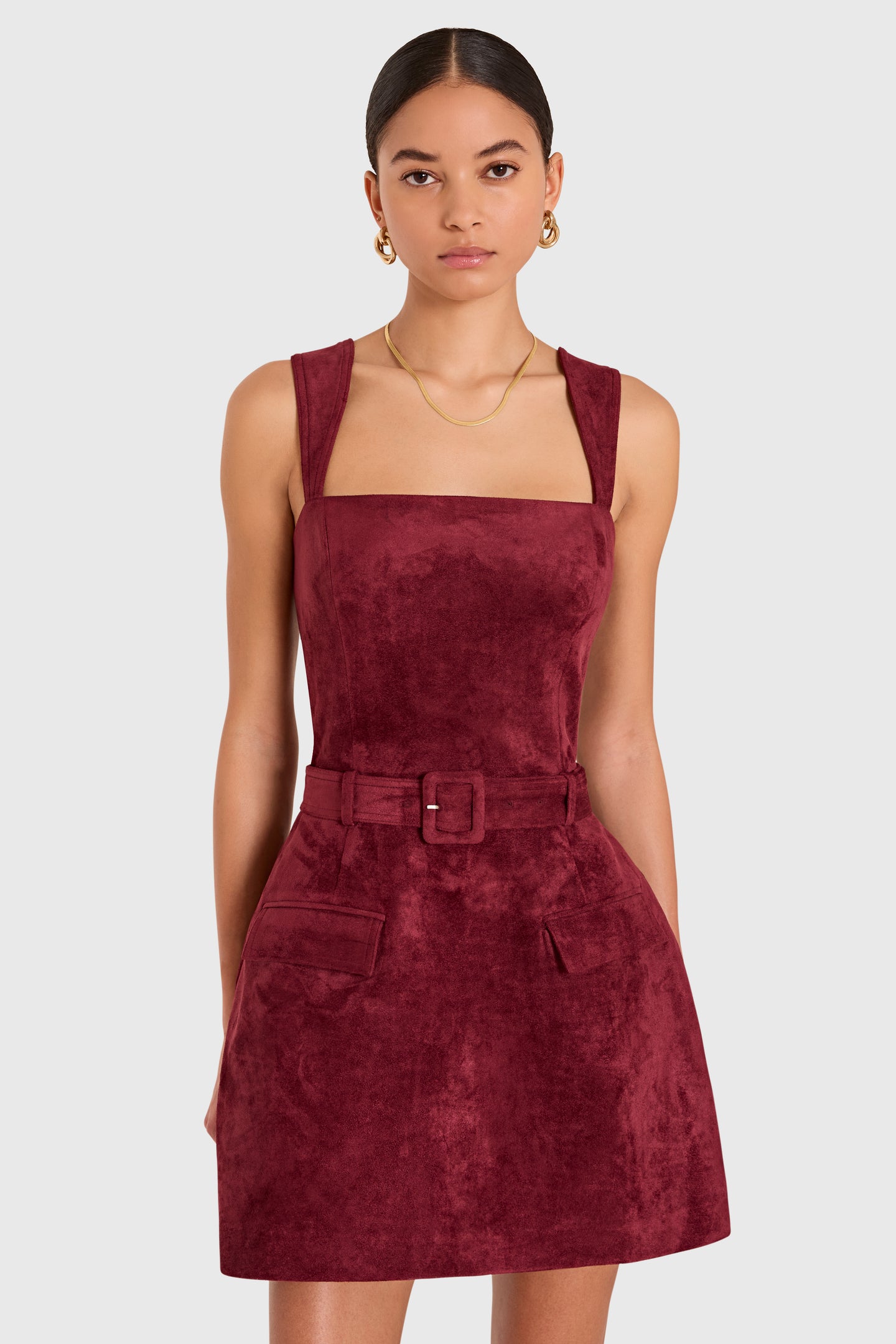 Amanda Uprichard Bethany Skort Romper in Suede in Burgundy - detail view