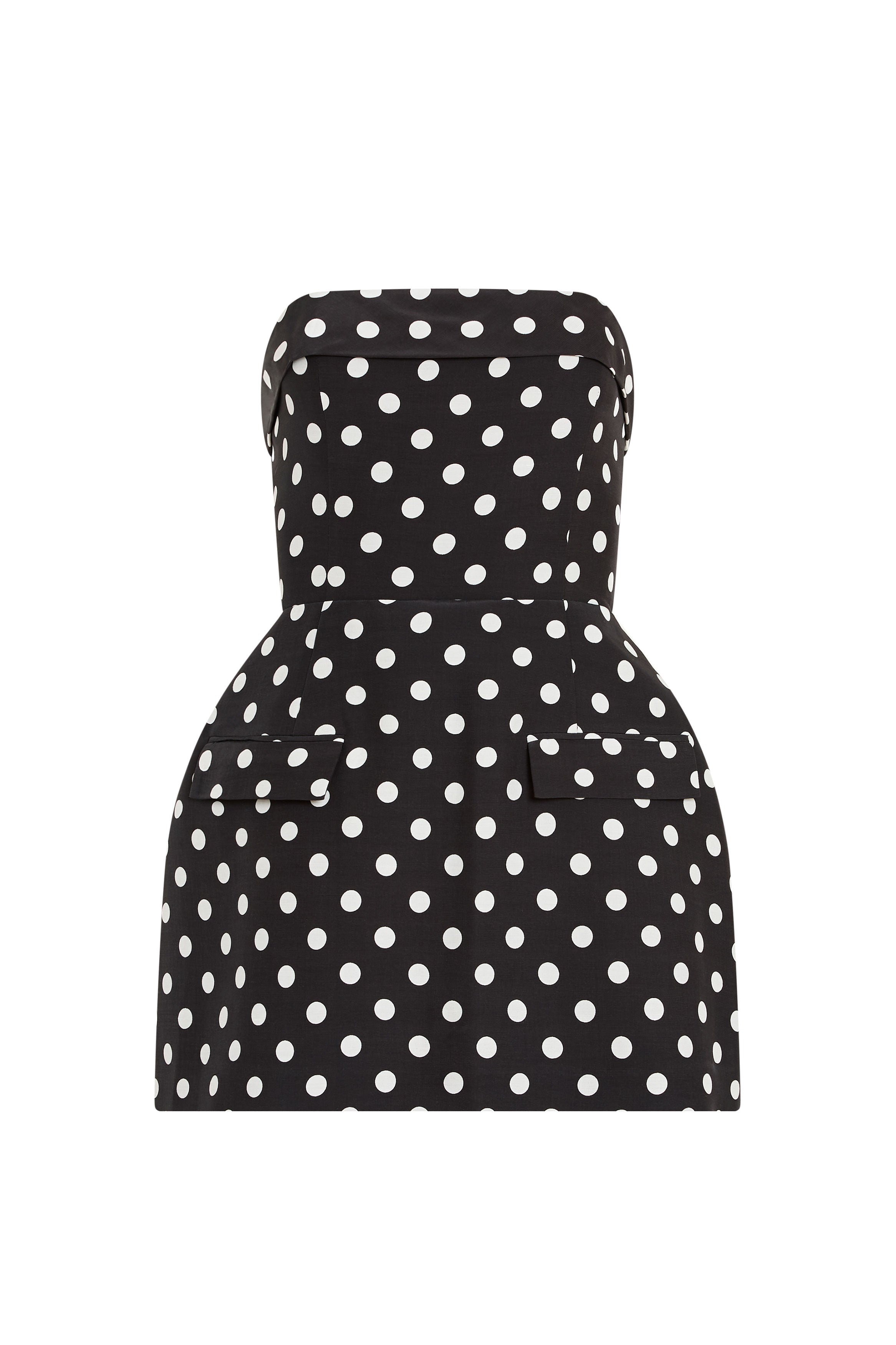 Black strapless dress with white polka dots on a white background