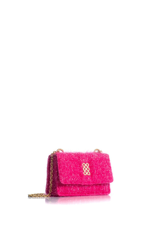 pink clutch handbag with gold design embellishments on front and double gold chain handle