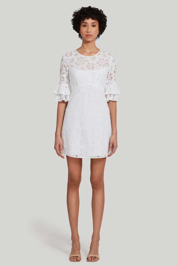 white lace mini dress with short bell sleeves
